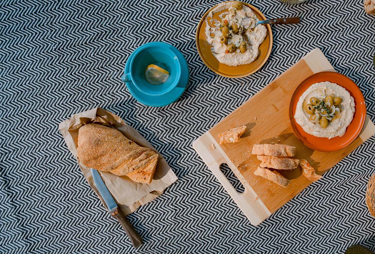 packed lunch sliced of bread on chaffing board picnic